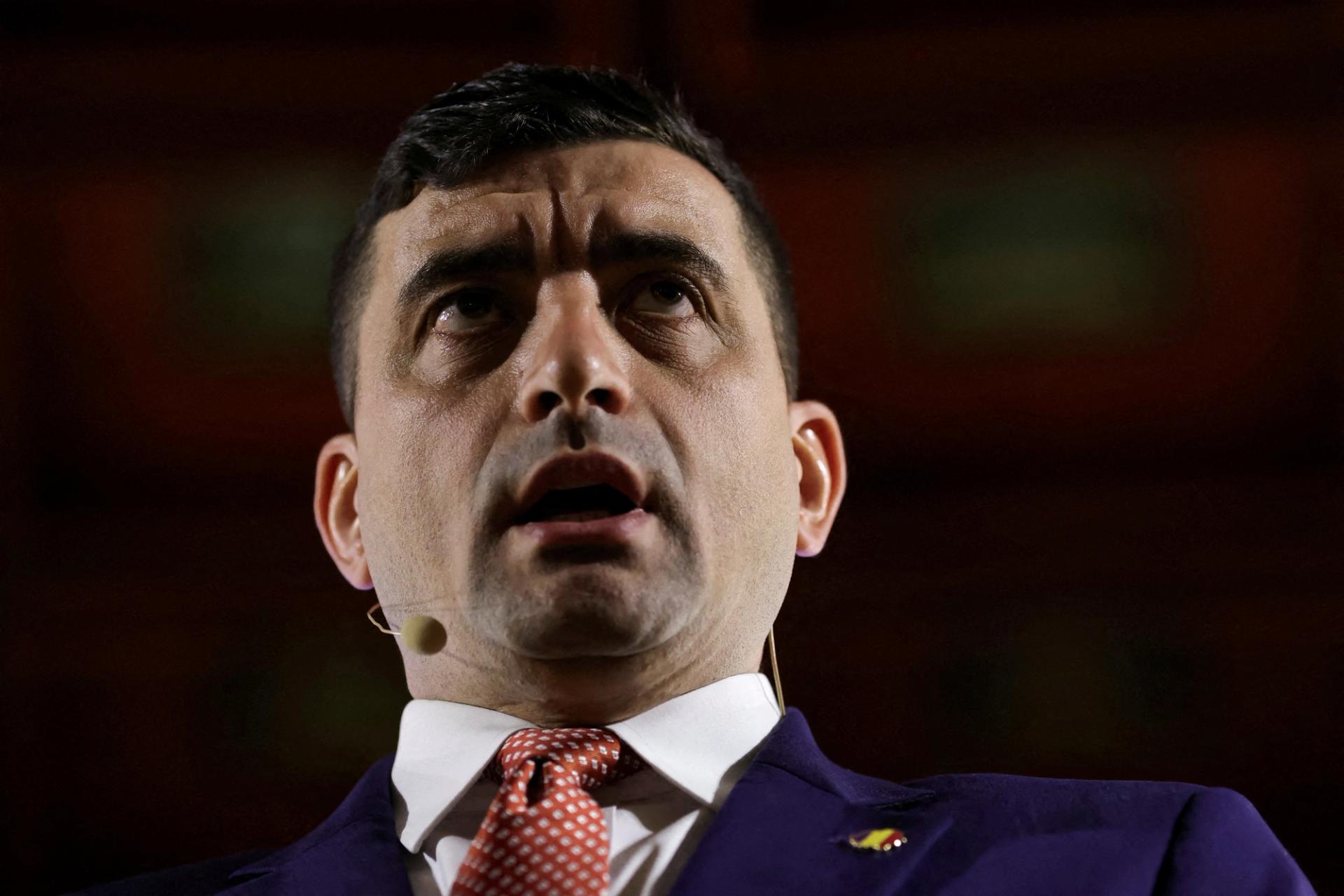 Far-right opposition leader and presidential candidate George Simion answers questions during a press conference, in Bucharest, Romania, April 11, 2025.