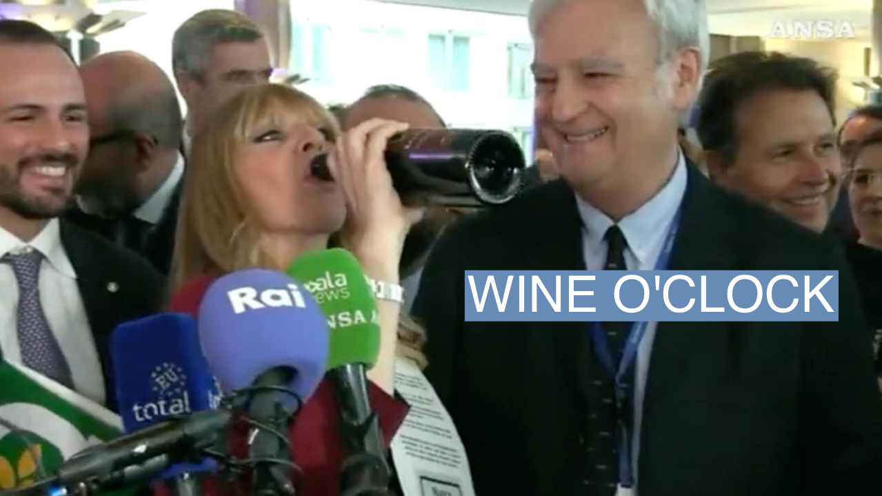 Alessandra Mussolini chugging wine at 11 a.m.
