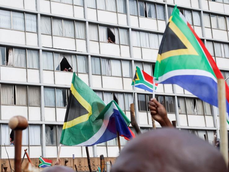 Flags over a protest in Durban.