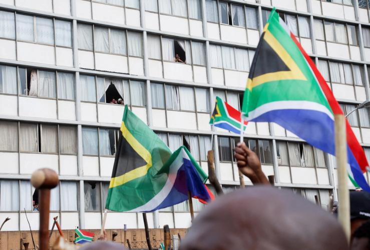 Flags over a protest in Durban.