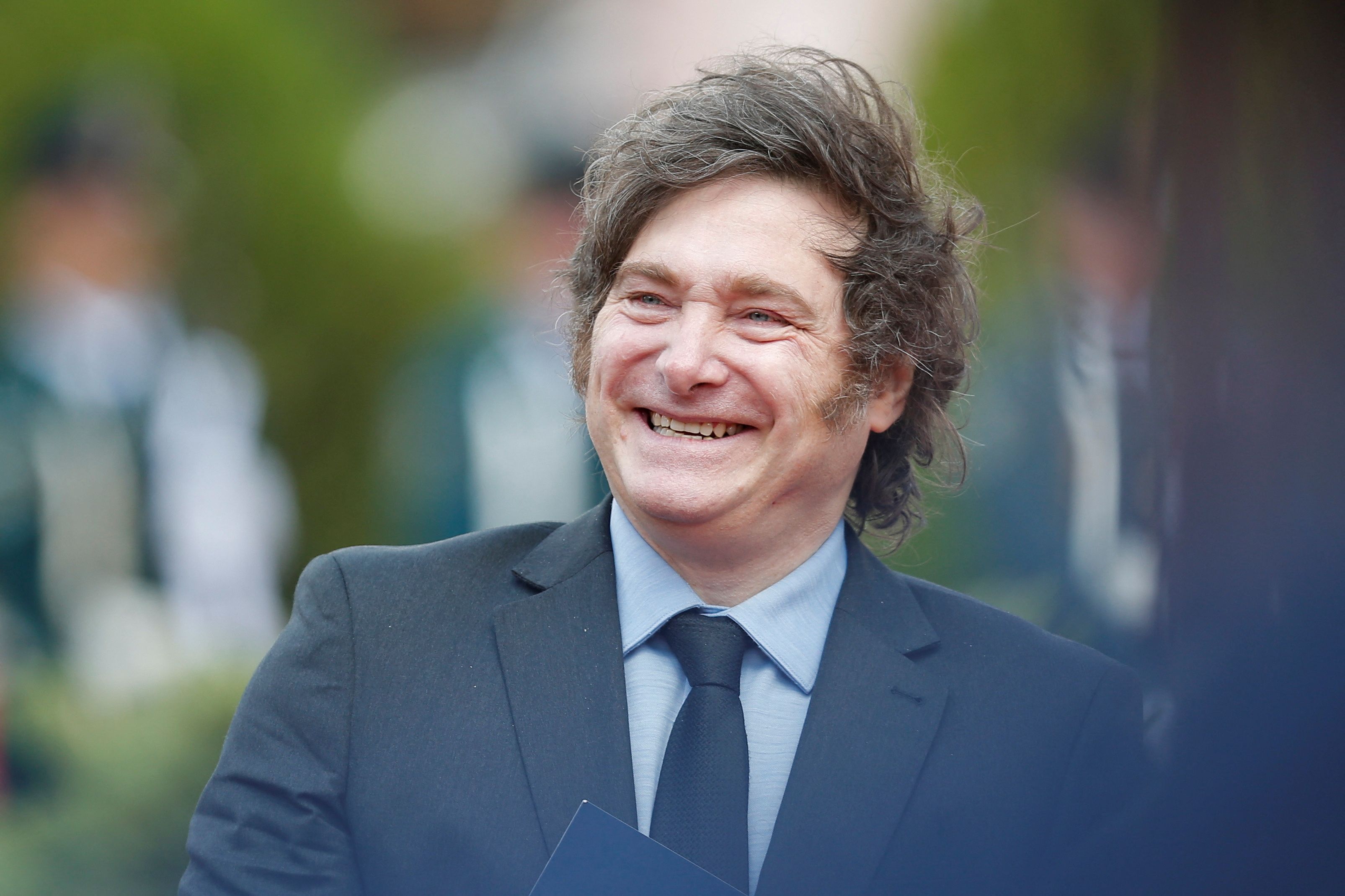 Argentina’s President Javier Milei smiling. 
