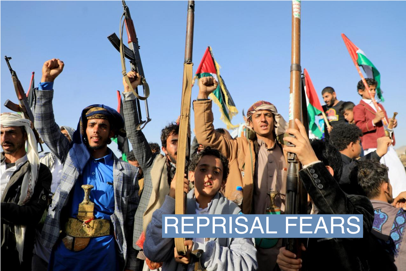 Houthi fighters brandish their weapons during a protest following US and British forces strikes, in the Huthi-controlled capital Sanaa on January 12, 2024 amid the ongoing battles between Israel and the militant Hamas group in Gaza. US and British forces struck rebel-held Yemen early on January 12, after weeks of disruptive attacks on Red Sea shipping by the Iran-backed Huthis who say they act in solidarity with Gaza. The pre-dawn air strikes add to escalating fears of wider conflict in the region, where violence involving Tehran-aligned groups in Yemen as well as Lebanon, Iraq and Syria has surged since the Israel-Hamas was began in early October. (Photo by MOHAMMED HUWAIS / AFP) (