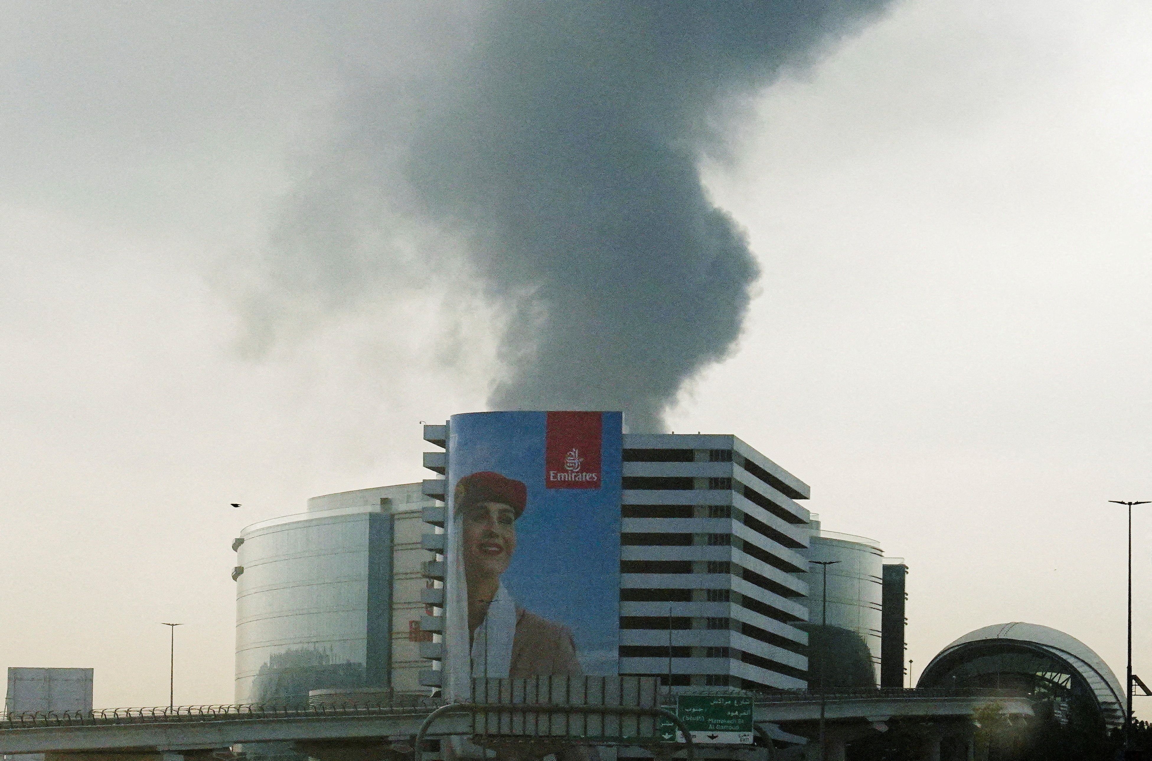 Smoke rising from an area near the Dubai International Airport.