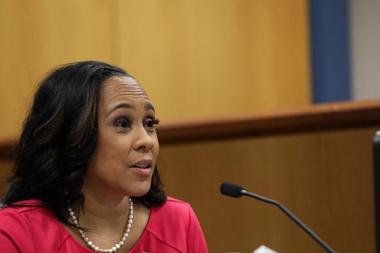 Fulton County District Attorney Fani Willis speaks during a hearing on Feb. 15, 2024.
