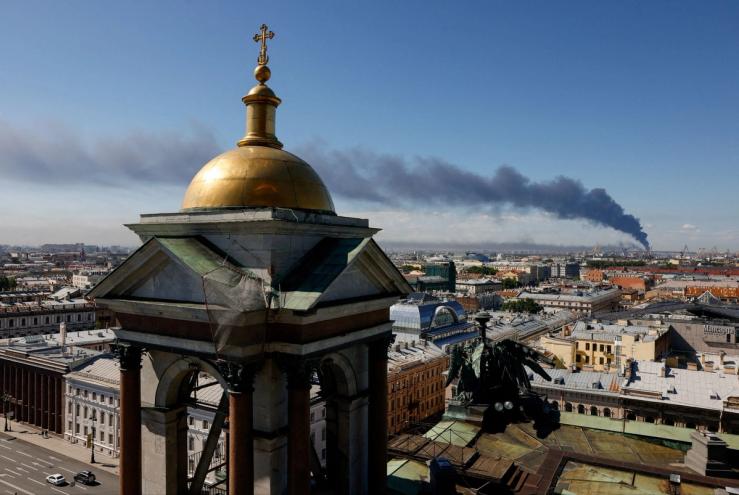 Smoke rises from a Ukrainian strike in St. Petersburg