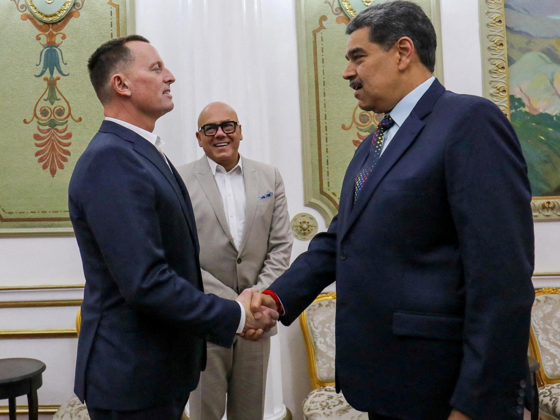 US special envoy Ric Grenell shaking hands with Venezuelan President Nicolás Maduro.