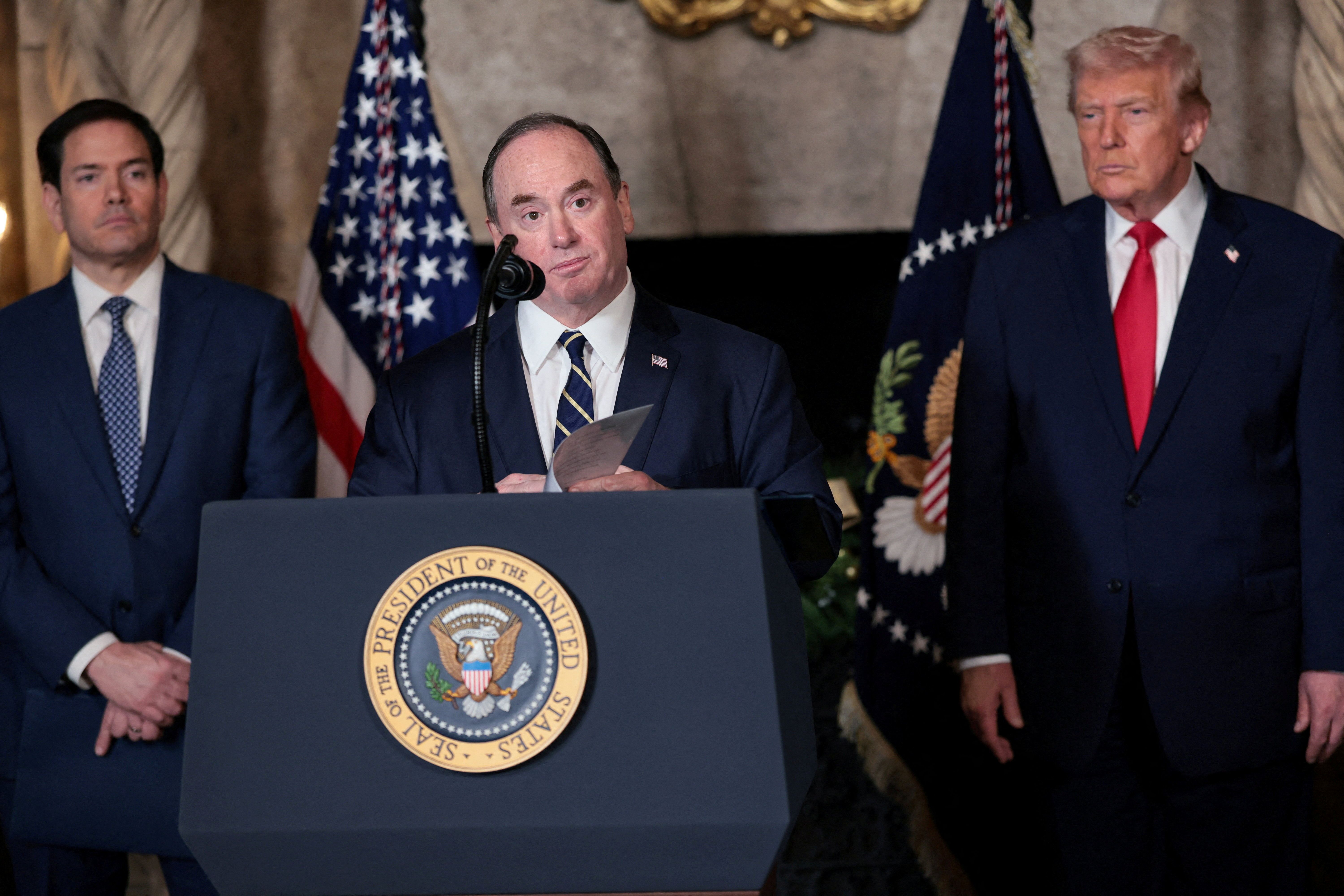 John Phelan beside Donald Trump