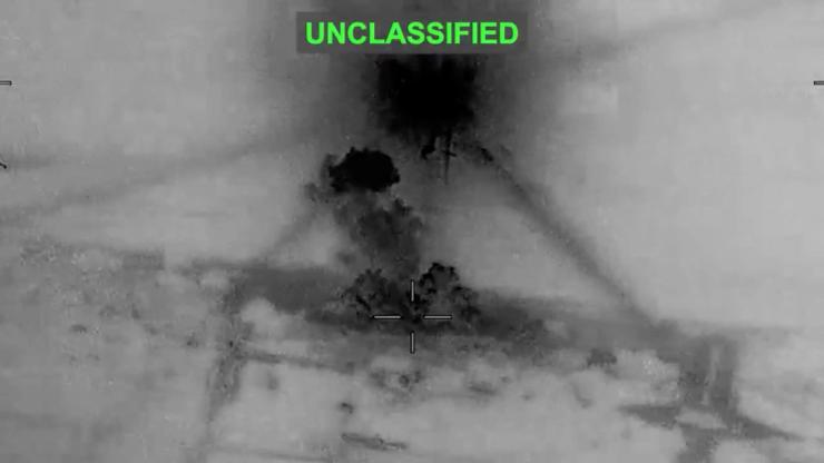 Smoke rises from explosions at an unknown location, following what CENTCOM said were strikes on Iran