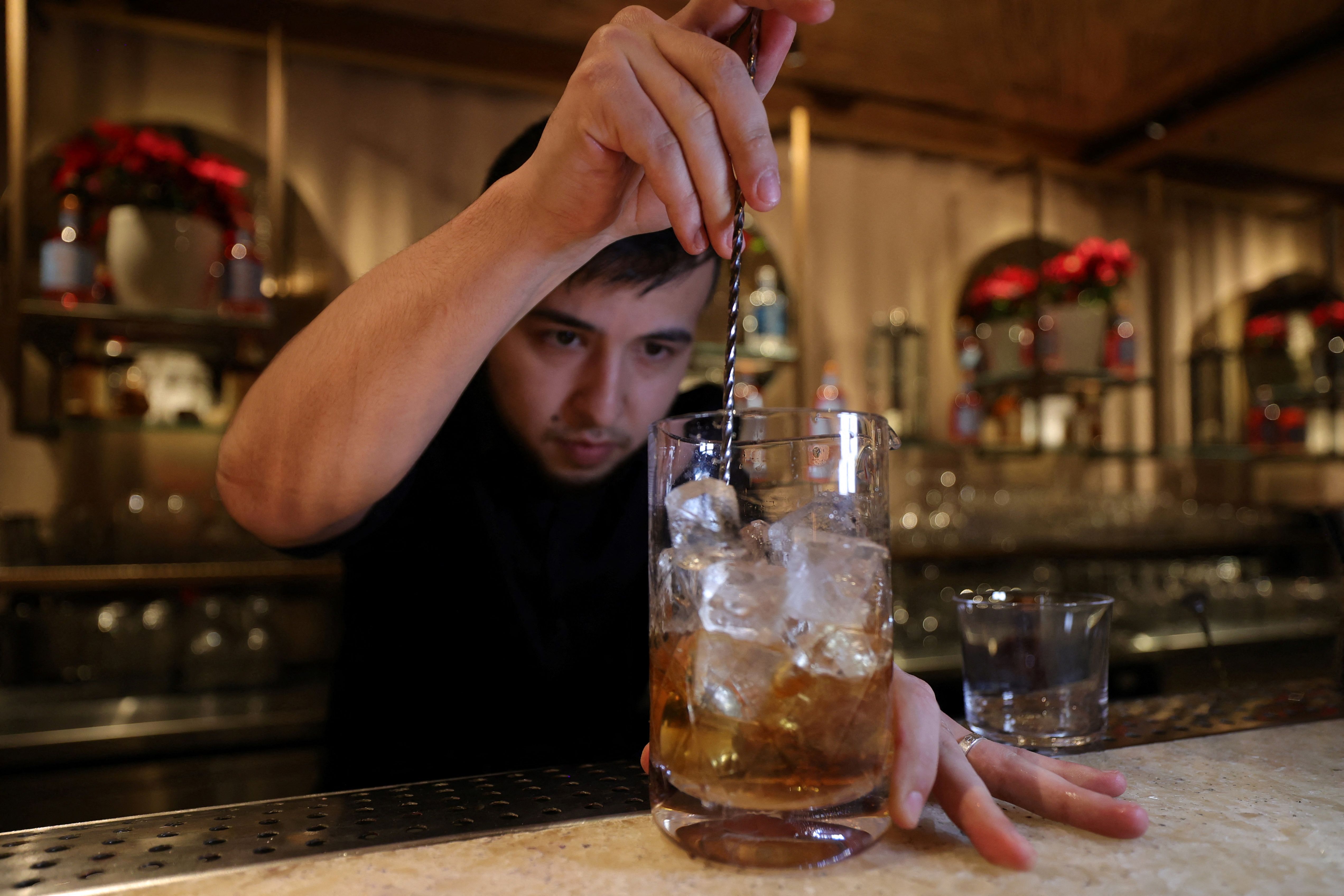 A bartender whips up a non-alcoholic cocktail in Riyadh.