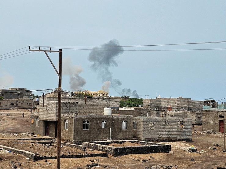 Smoke rises during Houthi missile and drone strikes in Mocha, Yemen.