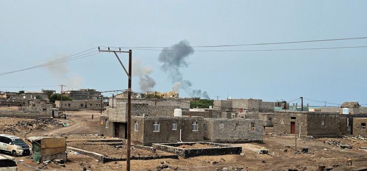 Smoke rises during Houthi missile and drone strikes in Mocha, Yemen.