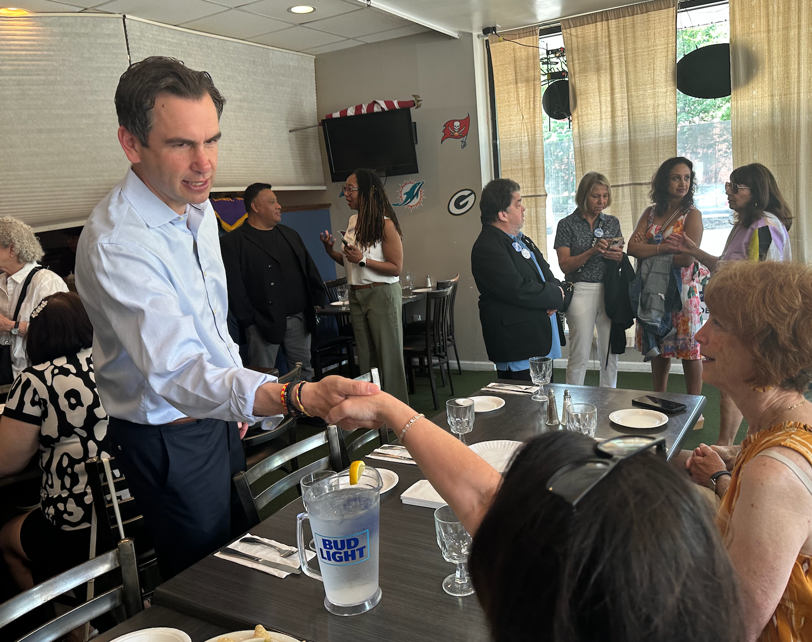 Jersey City Mayor Steven Fulop greets voters