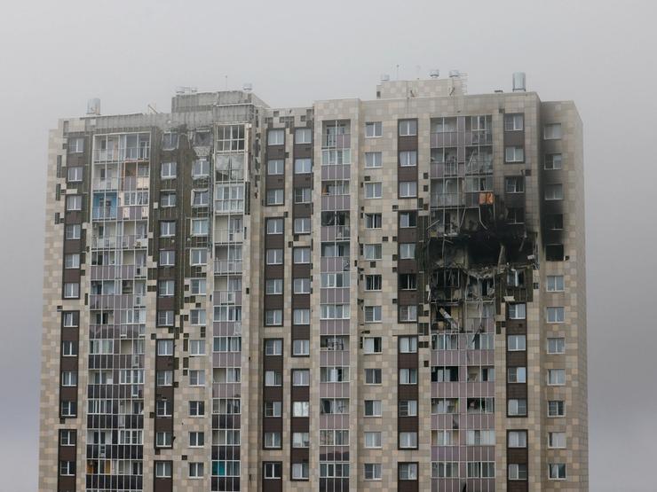 A damaged multi-storey residential building hit by what authorities described as a Ukrainian drone strike in Moscow