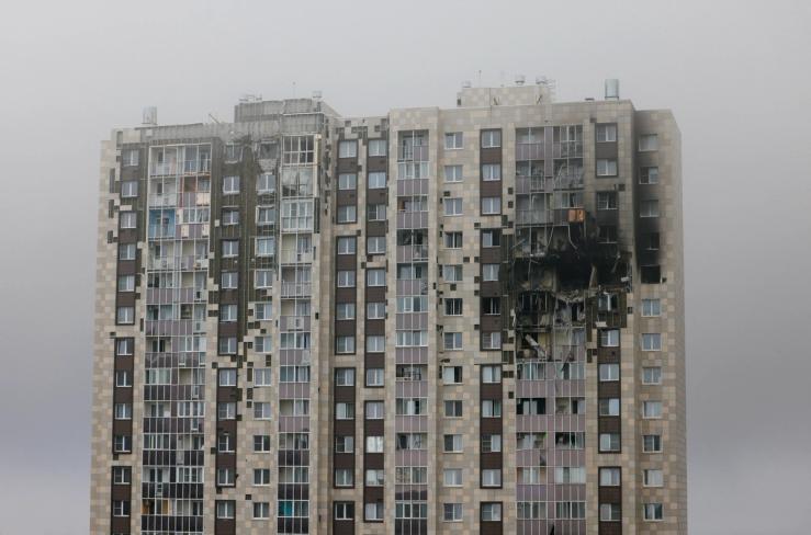 A damaged multi-storey residential building hit by what authorities described as a Ukrainian drone strike in Moscow