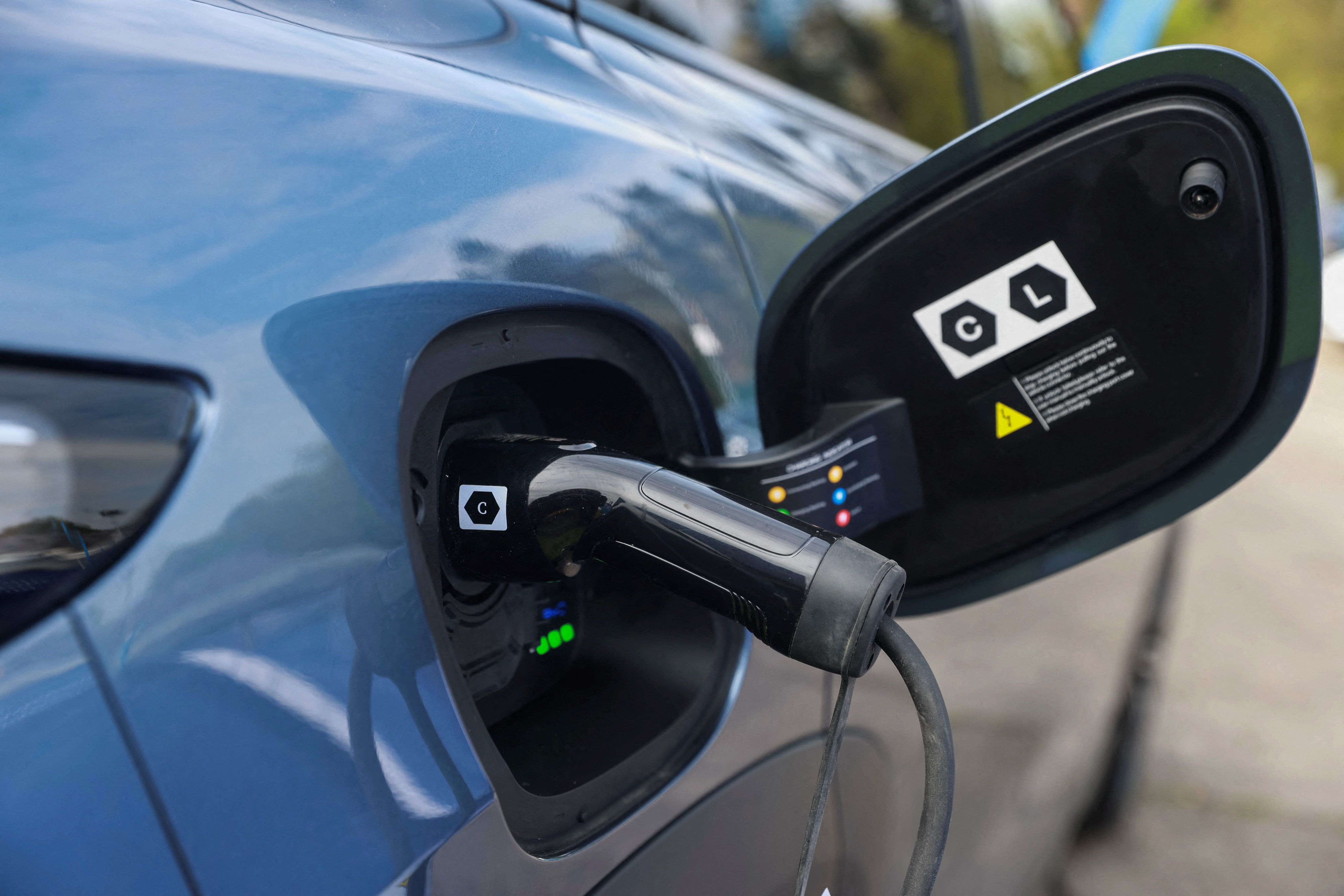 A BYD Sealion 7 electric car is charged.