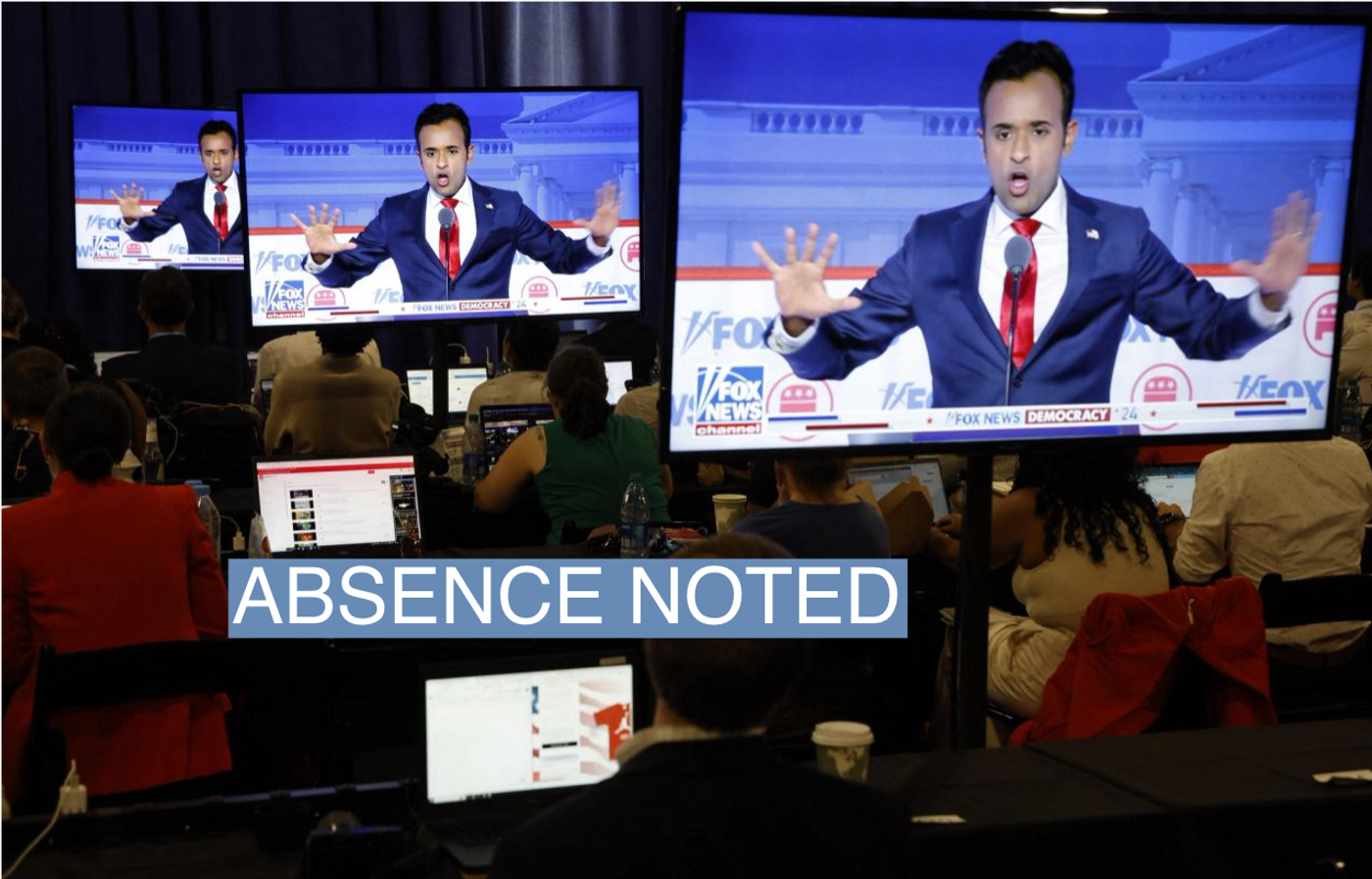 Former biotech executive Vivek Ramaswamy is seen debating on screens in the media filing center at the first Republican candidates' debate of the 2024 U.S. presidential campaign in Milwaukee, Wisconsin, U.S. August 23, 2023. REUTERS/Jonathan Ernst