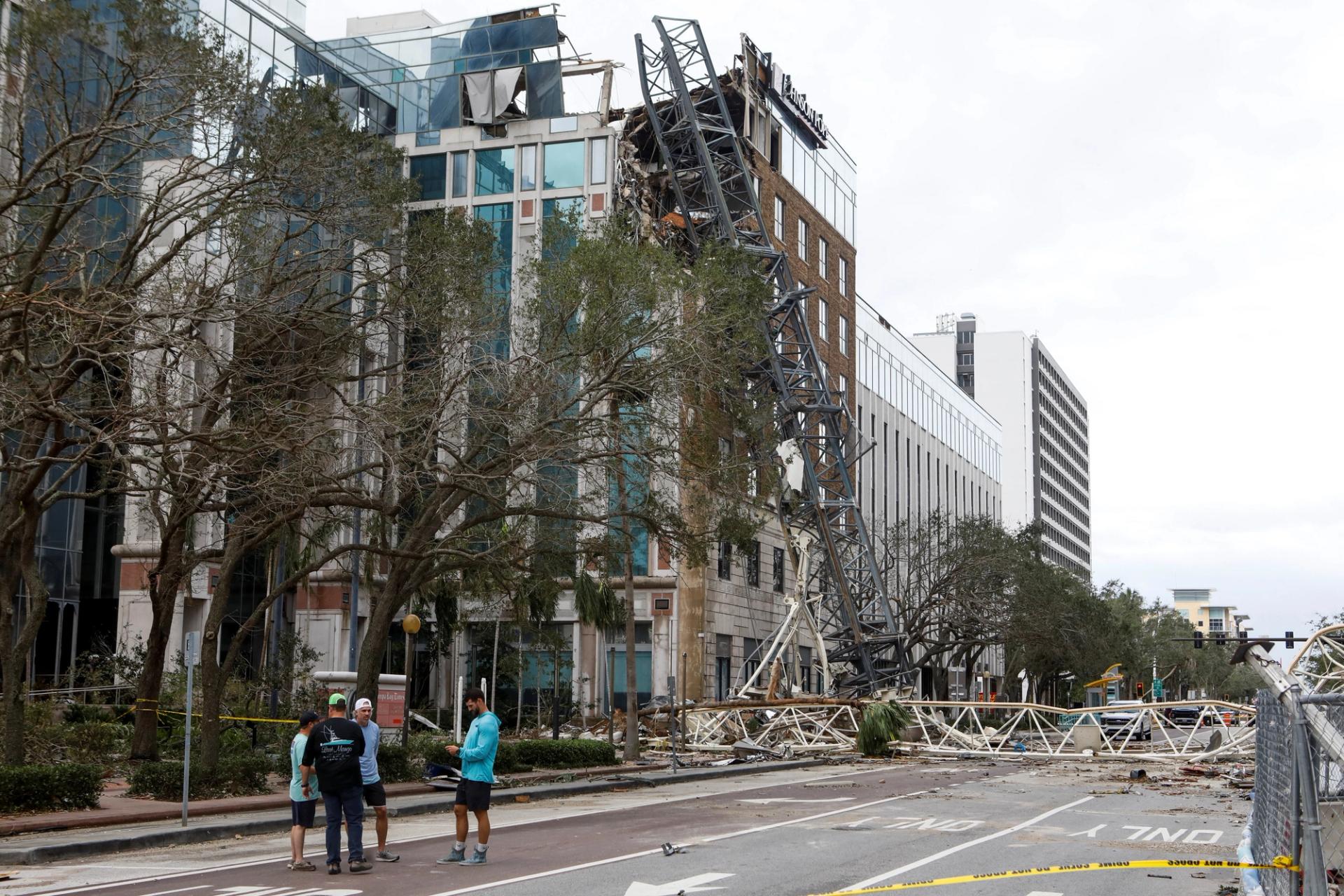 A view shows a collapsed construction crane that fell on the building that also hosts the offices of the Tampa Bay Times, after Hurricane Milton made landfall, in downtown St. Petersburg, Florida, U.S. October 10, 2024.