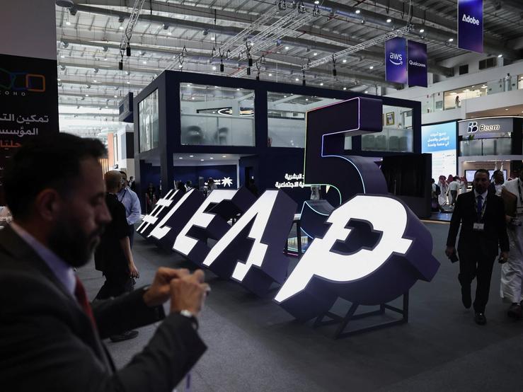 Visitors make their way to the main hall during the opening ceremony of the technology event LEAP in Riyadh.