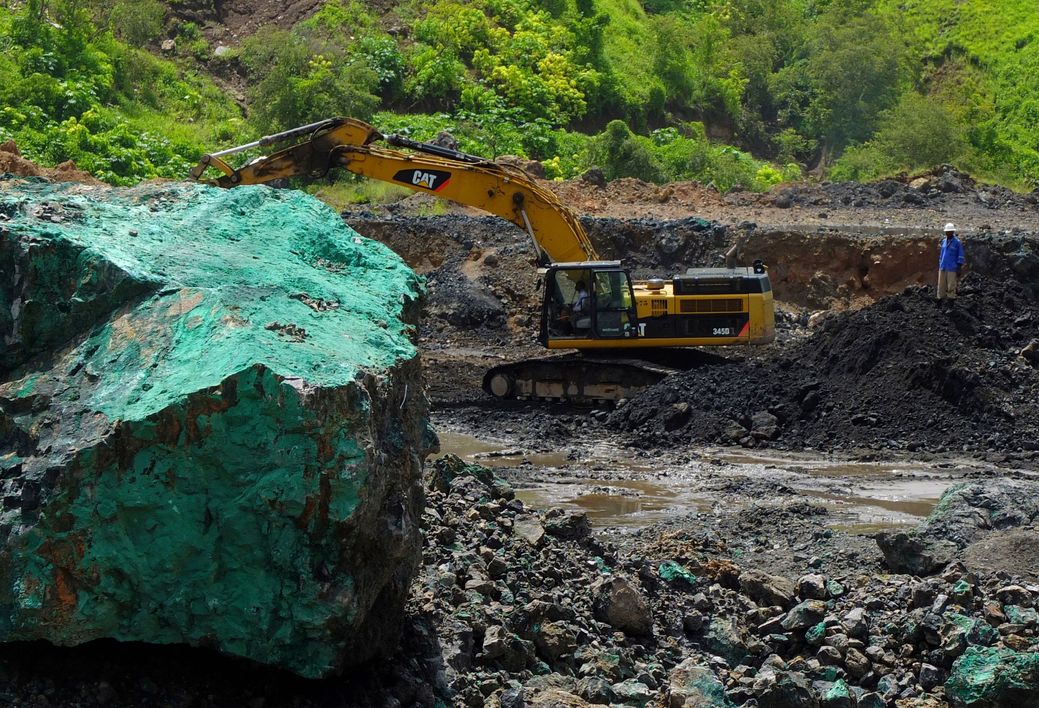 An excavator is used at the bottom of Congolese state mining company Gecamines’ Kamfundwa open pit copper mine. 