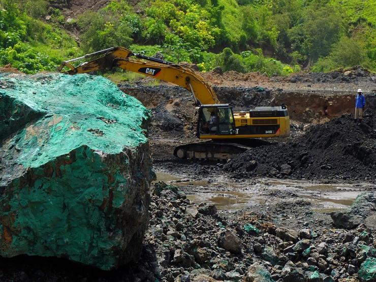 An excavator is used at the bottom of Congolese state mining company Gecamines’ Kamfundwa open pit copper mine.