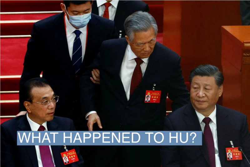 Former Chinese president Hu Jintao leaves his seat next to Chinese President Xi Jinping and Premier Li Keqiang, during the closing ceremony of the 20th National Congress of the Communist Party of China, at the Great Hall of the People in Beijing, China. 