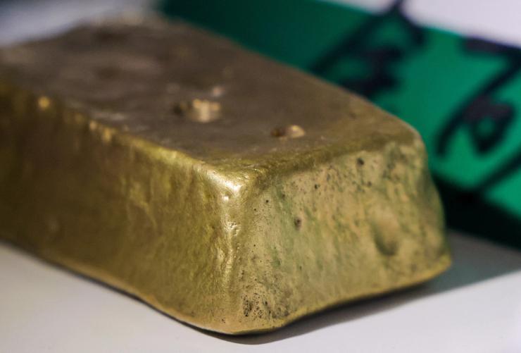 A raw gold bar is displayed at Nigeria’s booth at the 8th China International Import Expo (CIIE) venue in Shanghai