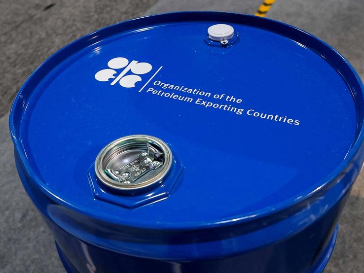 An installation depicting barrel of oil with the logo of Organization of the Petroleum Exporting Countries