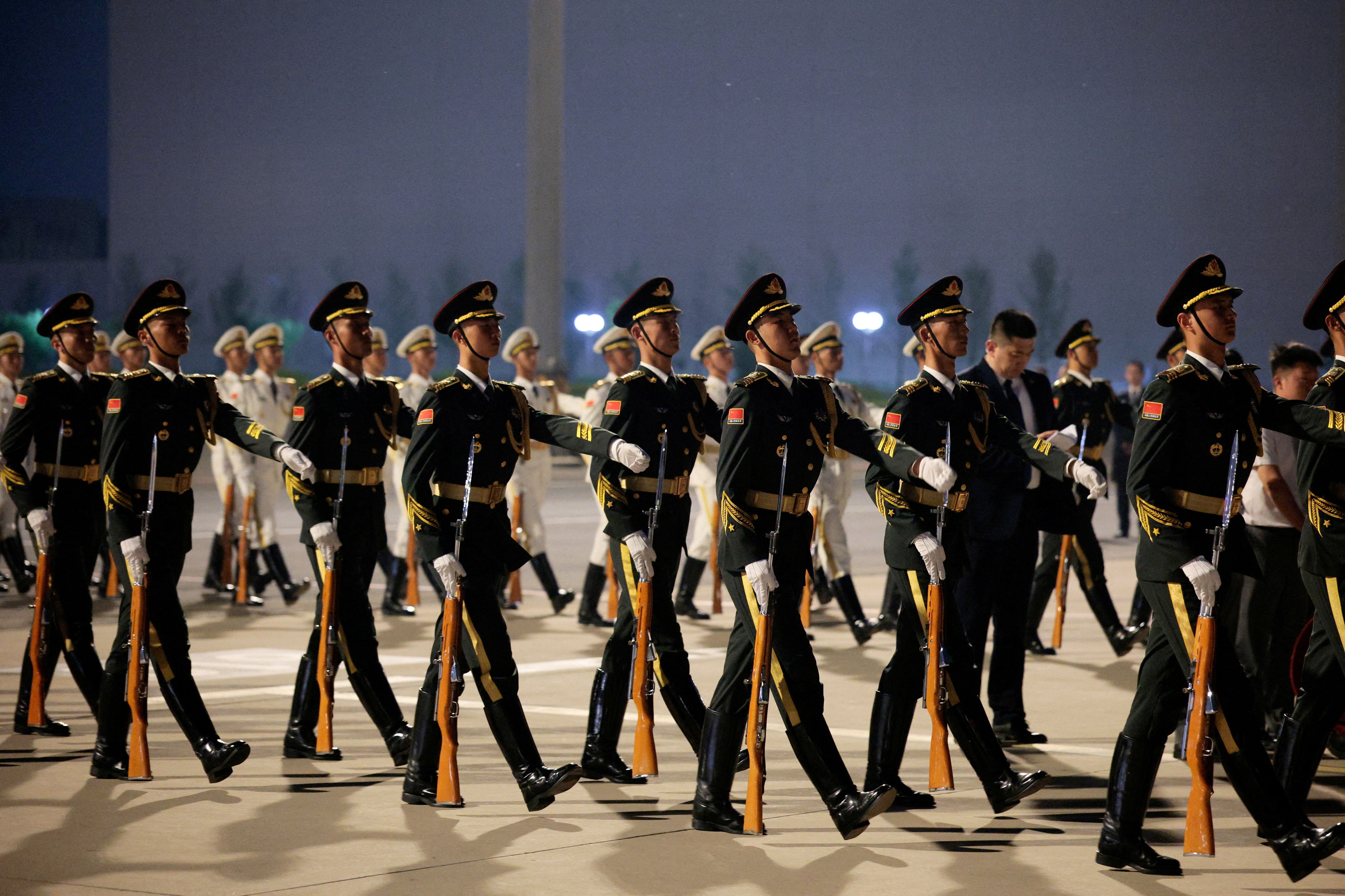 Members of Chinese military prepare for Trump’s arrival in Beijing. 