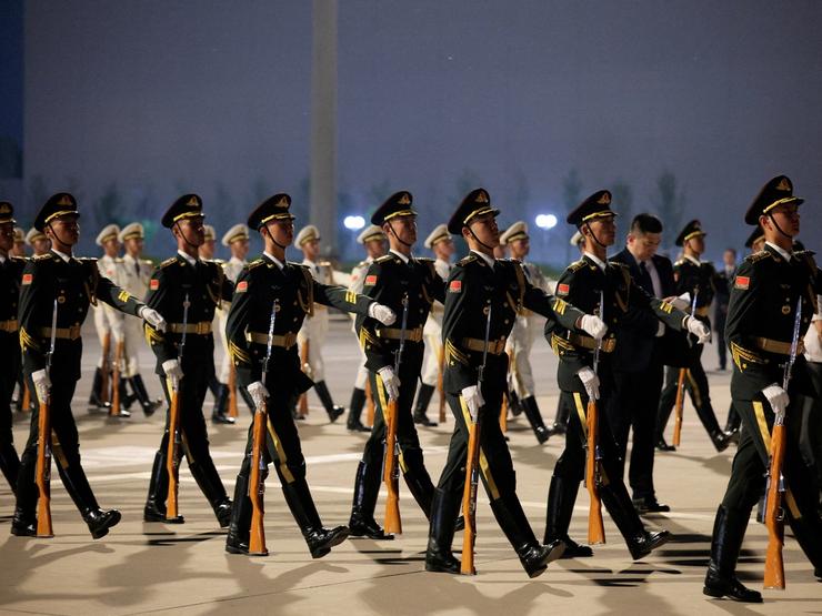 Members of Chinese military prepare for Trump’s arrival in Beijing.