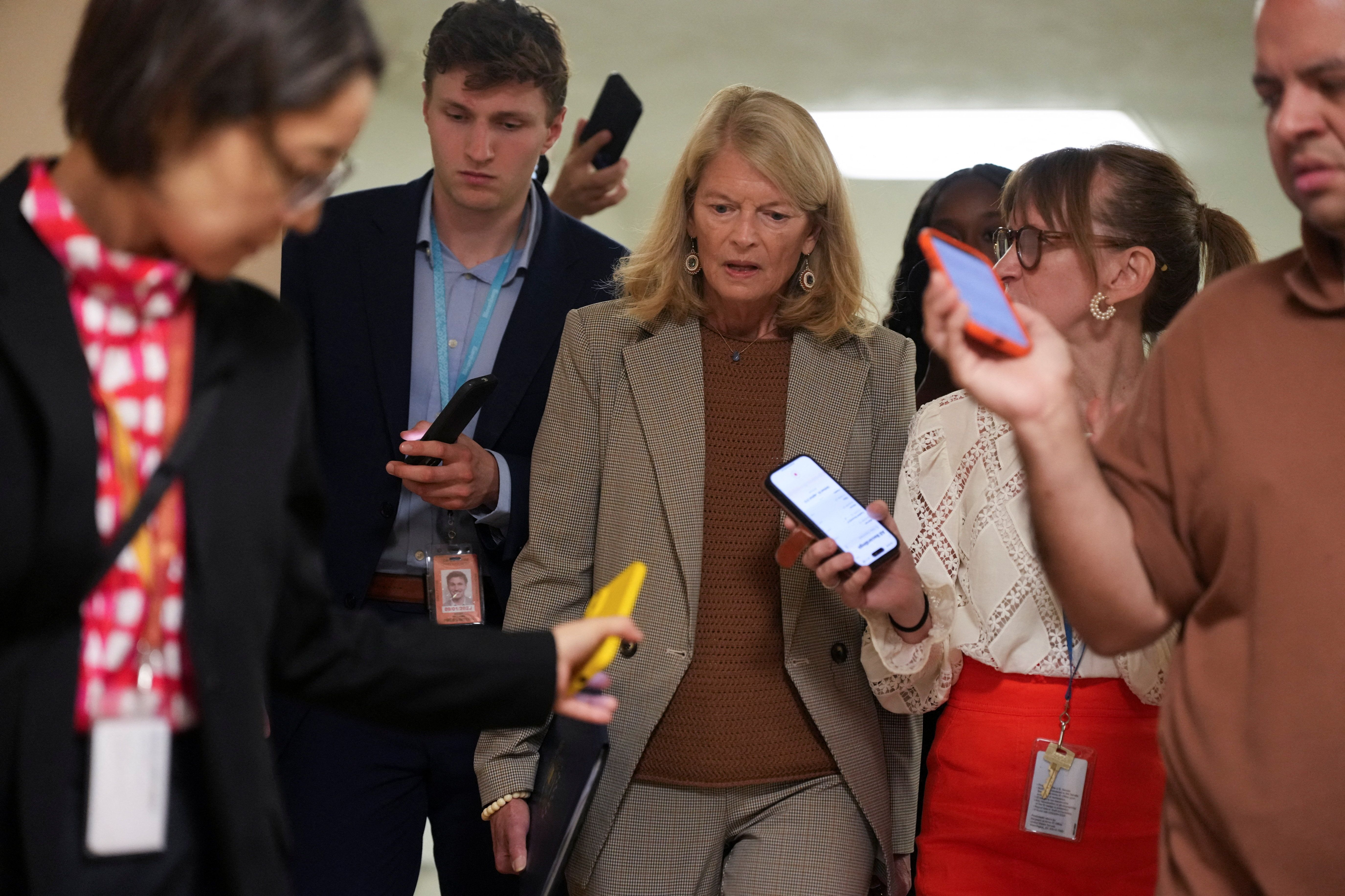 U.S. Senator Lisa Murkowski (R-AK) speaks to reporters as she arrives for votes at the U.S. Capitol in Washington, D.C., U.S., August 7, 2026. 