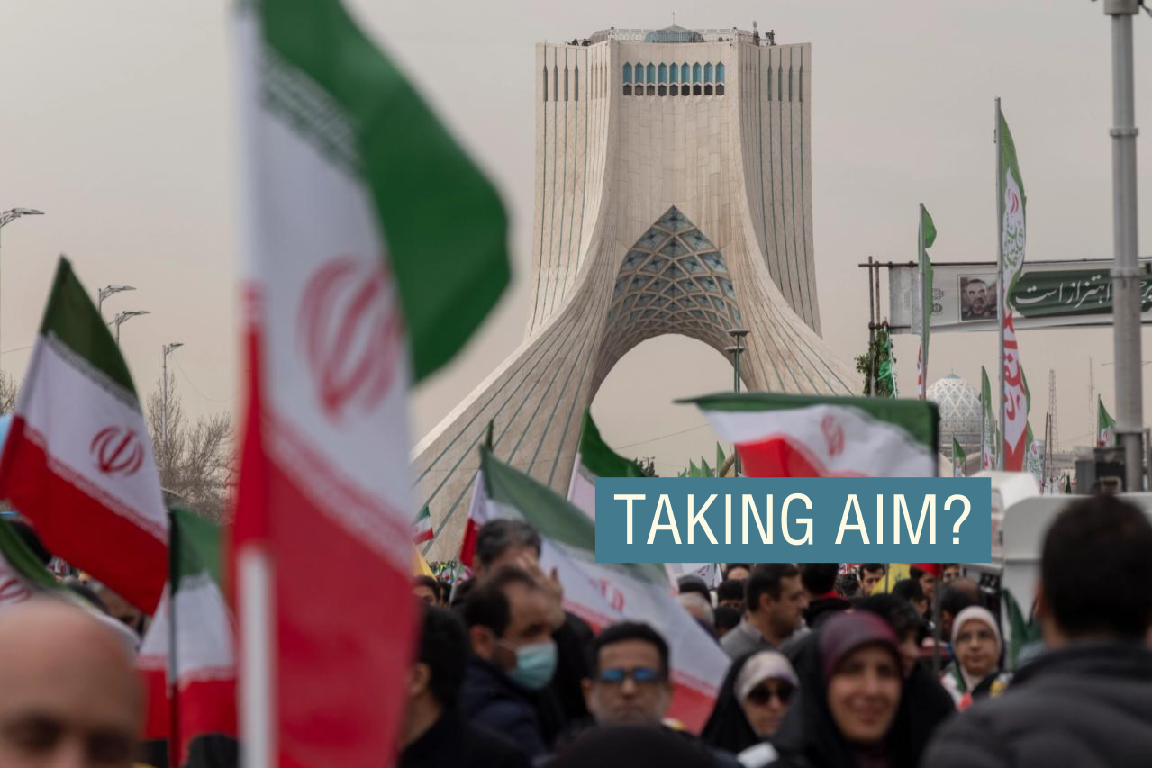 Iranian people walk under the Azadi (freedom) monument and participate in a rally commemorating the 47th anniversary of the Islamic Revolution’s victory in Tehran.