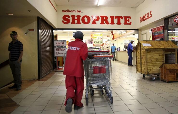 A worker pushes trolleys at the Shoprite store in Johannesburg, South Africa.