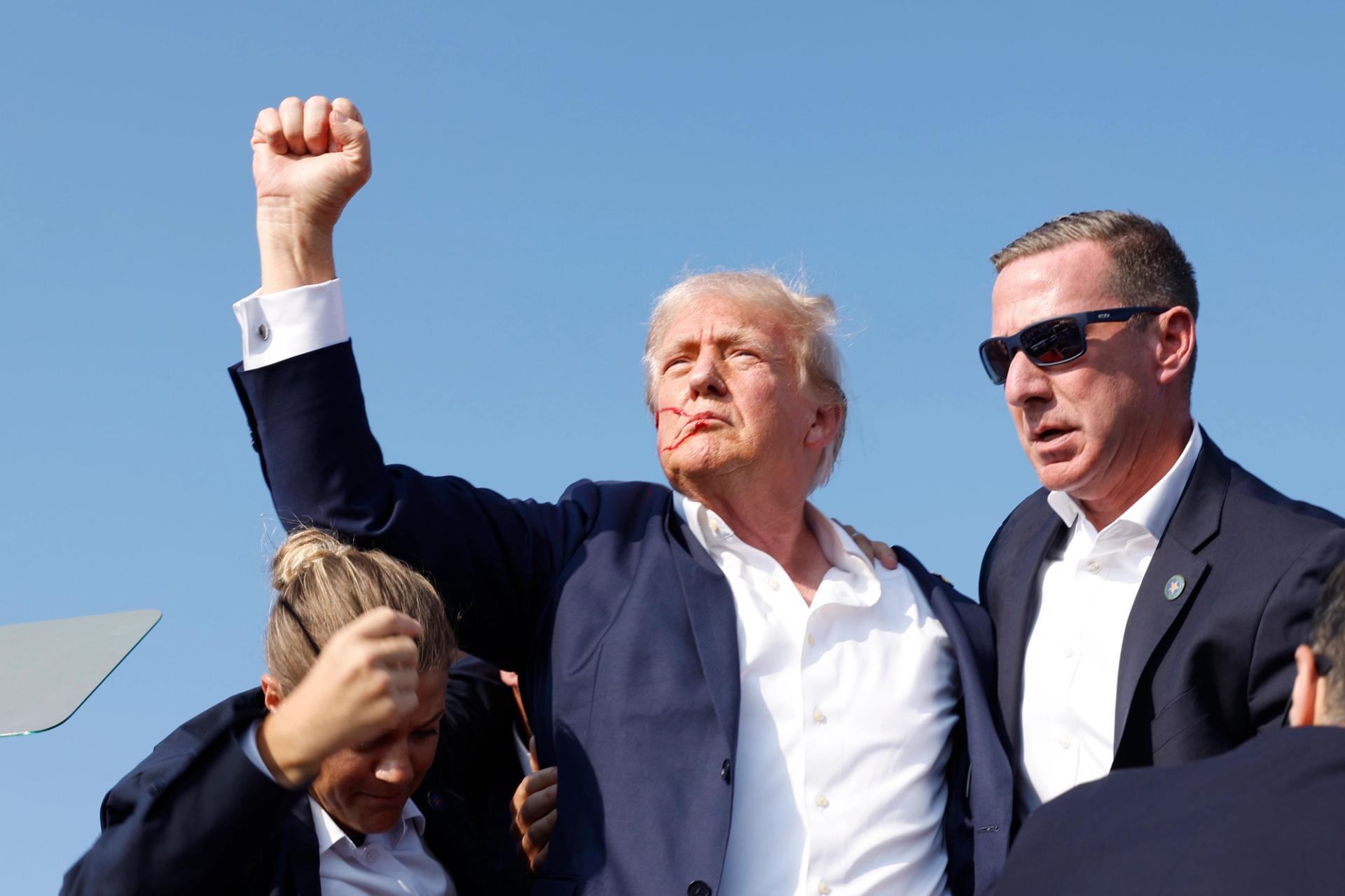 Trump is rushed offstage during a rally in Butler, Pennsylvania