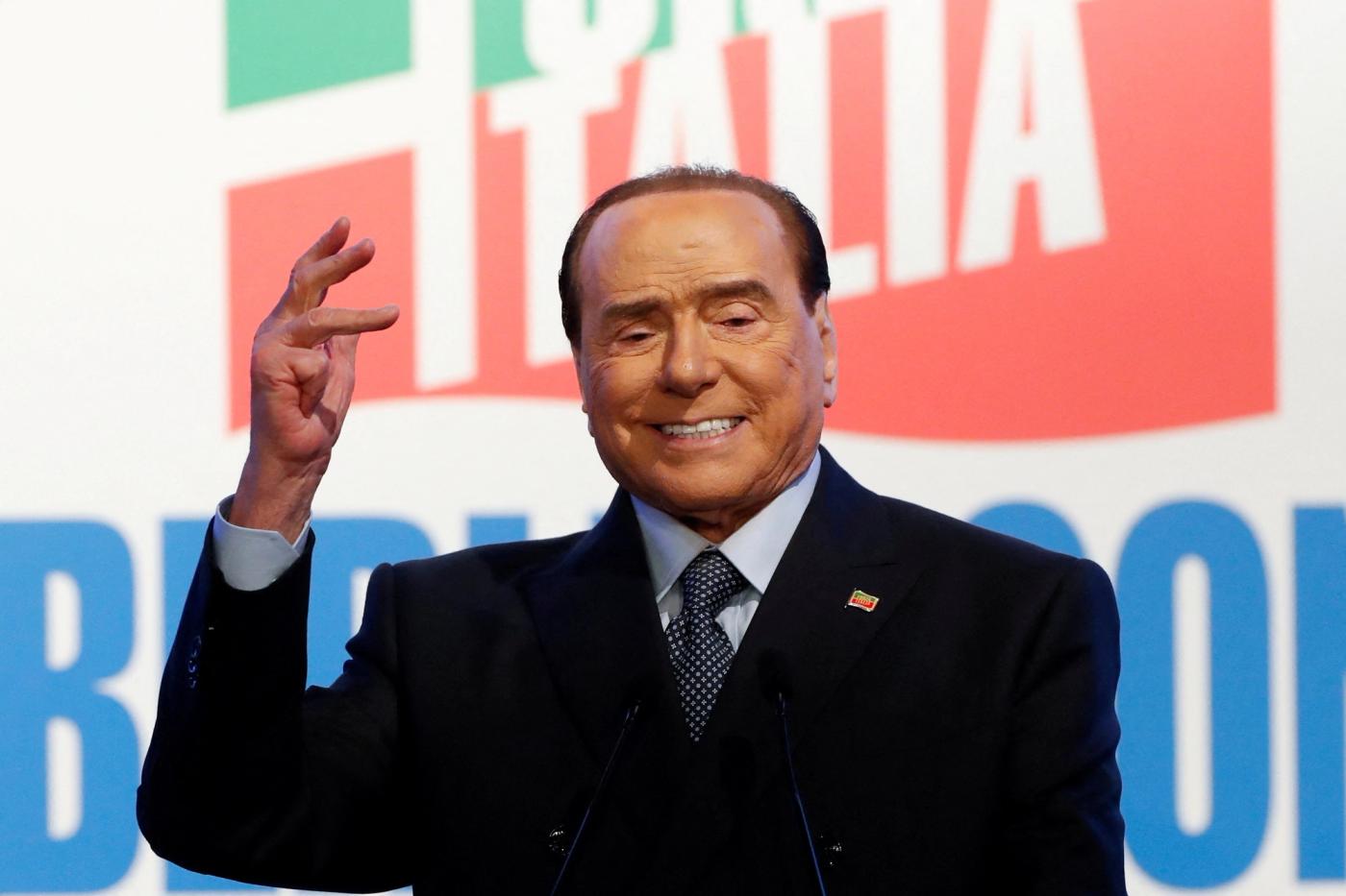 Former Italian Prime Minister and leader of the Forza Italia (Go Italy!) party Silvio Berlusconi attends a rally in Rome, Italy, April 9, 2022. REUTERS/Remo Casilli/File Photo