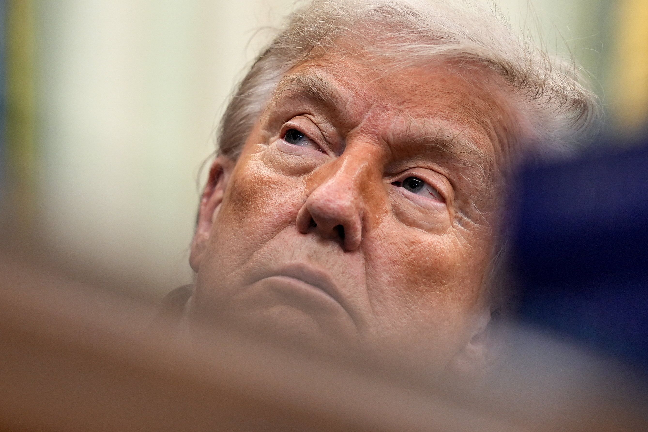 U.S. President Donald Trump looks on as he sits in the Oval Office of the White House in Washington, D.C., U.S.