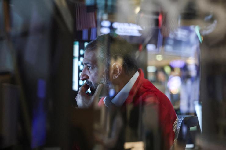 A trader works on the floor at the New York Stock Exchange