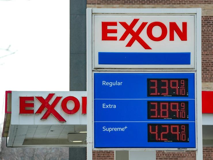 Gas prices are shown at an Exxon station.