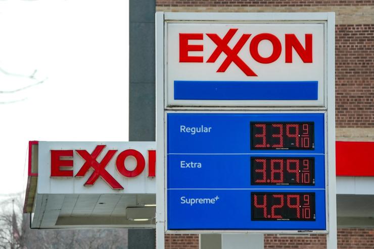 Gas prices are shown at an Exxon station.