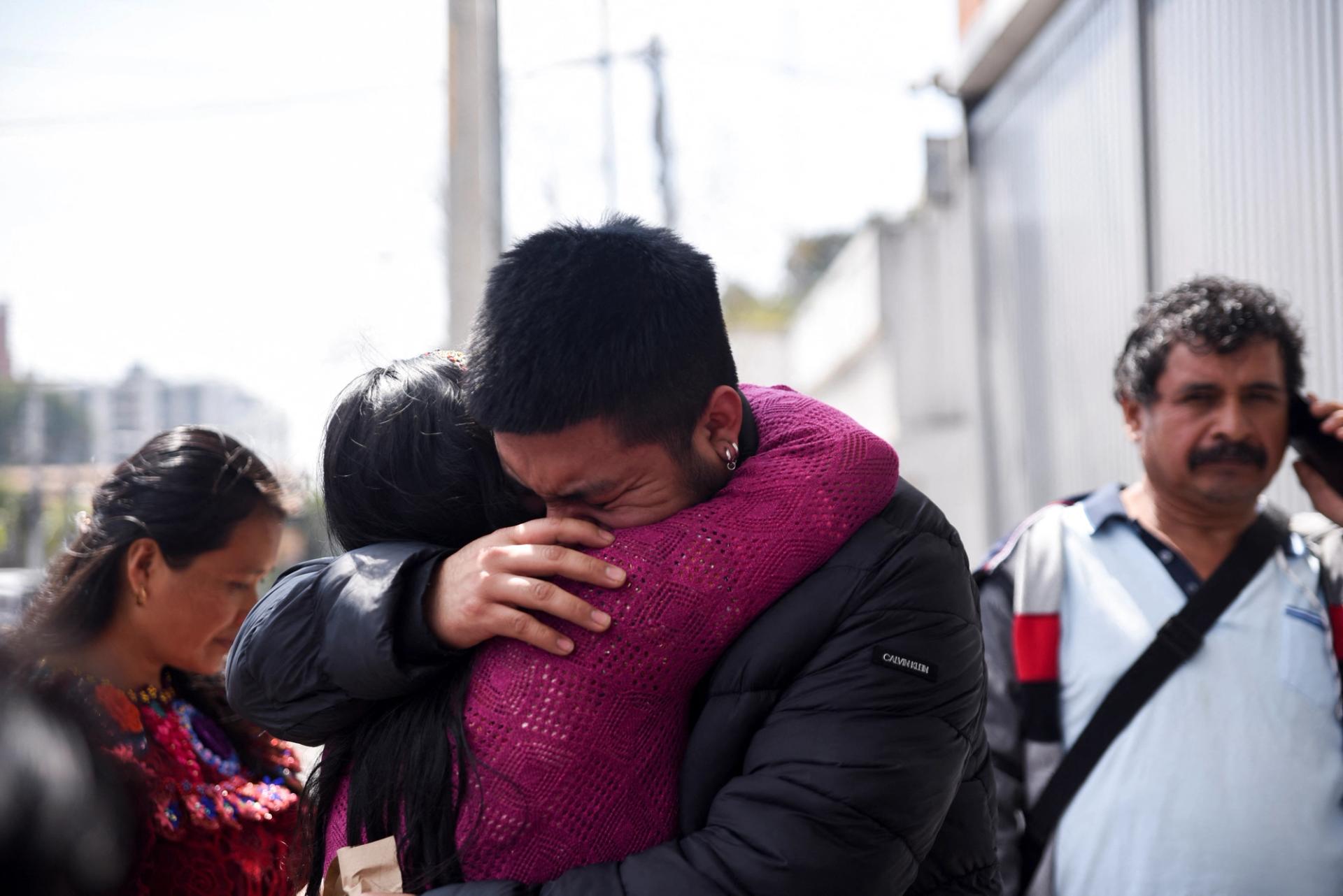 A migrant is greeted by a family member outside the Returned Migrant Reception Center, after he and other Guatemalan migrants arrived at La Aurora Air Force Base on a deportation flight from the U.S., in Guatemala City, Guatemala, January 20, 2025. 