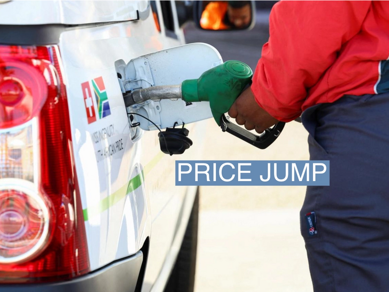 A petrol station attendant fills up a car ahead of a petrol price increase effective from midnight, in Cape Town, South Africa, September 5, 2023. REUTERS/Esa Alexander