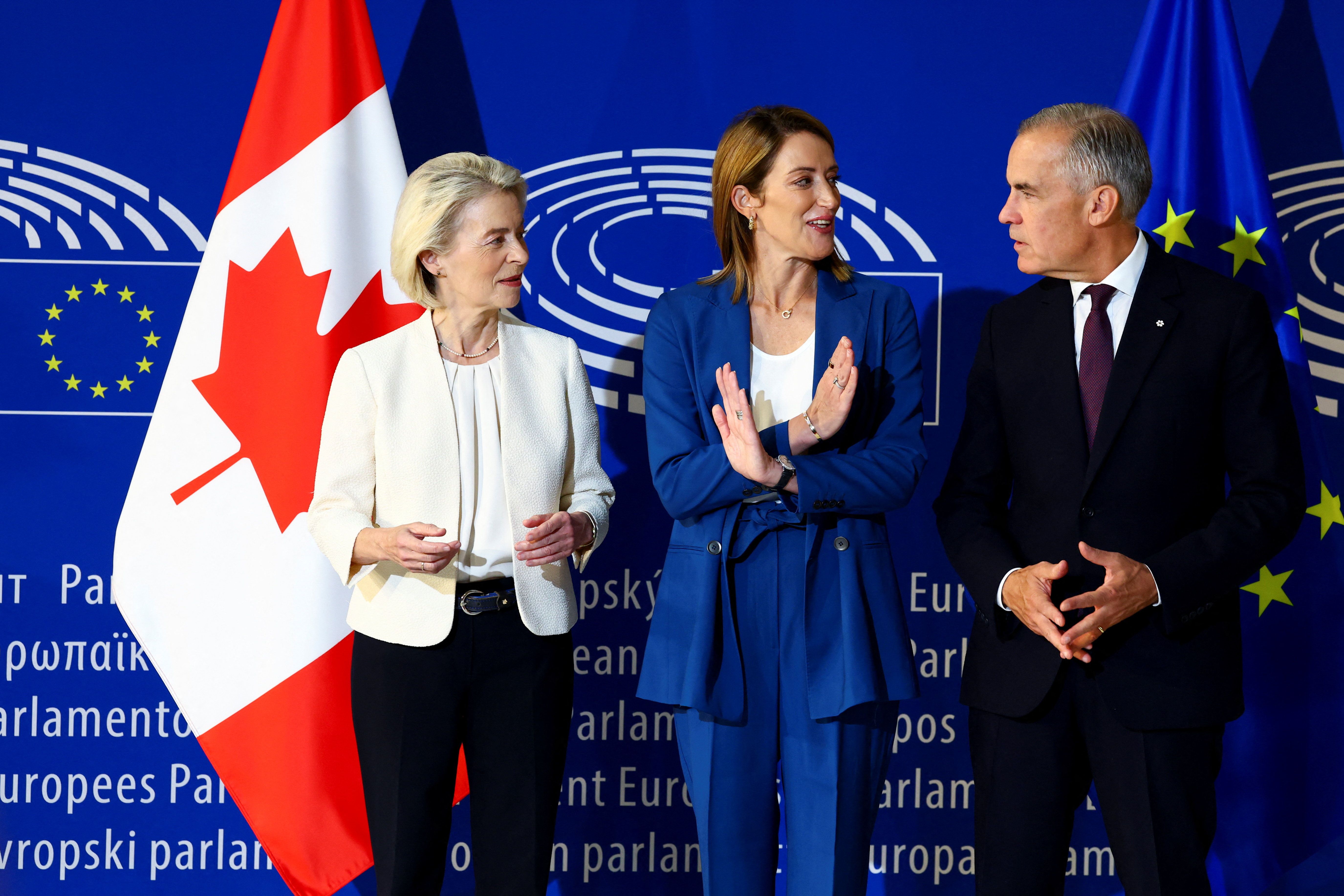 European Commission President Ursula von der Leyen, European Parliament President Roberta Metsola and Canadian Prime Minister Mark Carney. 
