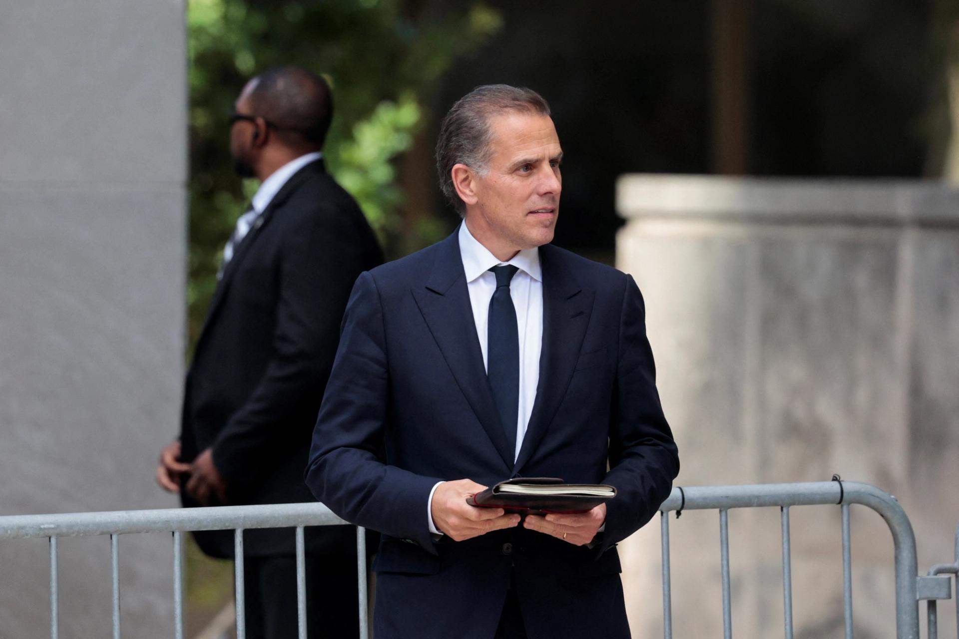 Hunter Biden, son of U.S. President Joe Biden, walks outside the federal court on the day of his trial on criminal gun charges, in Wilmington, Delaware, on June 10, 2024