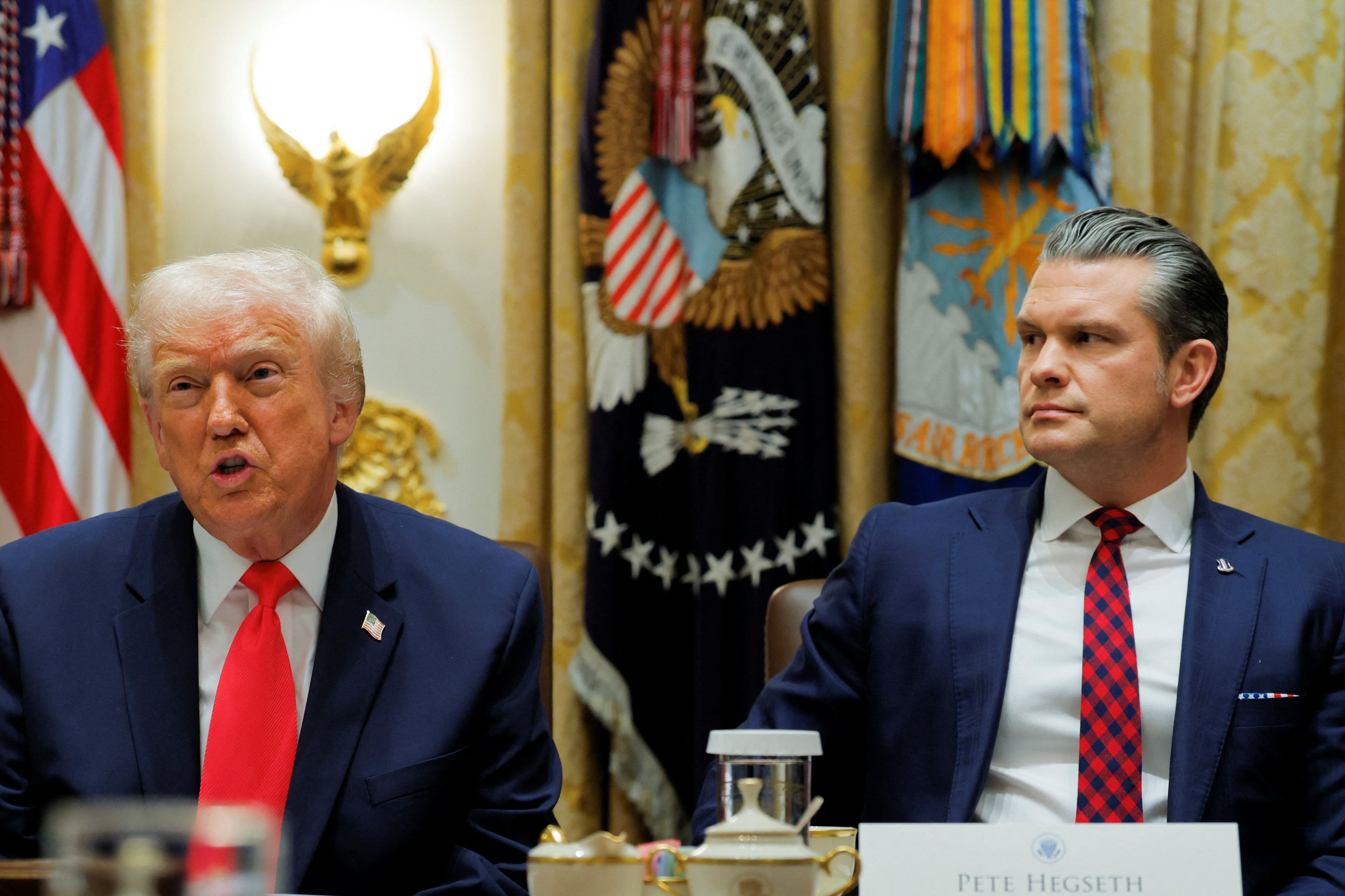 U.S. President Donald Trump and Defense Secretary Pete Hegseth at the White House in Washington