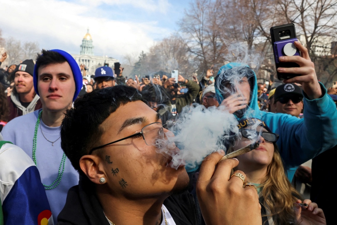  A man smokes cannabis in Denver, Colorado, April 20, 2023.