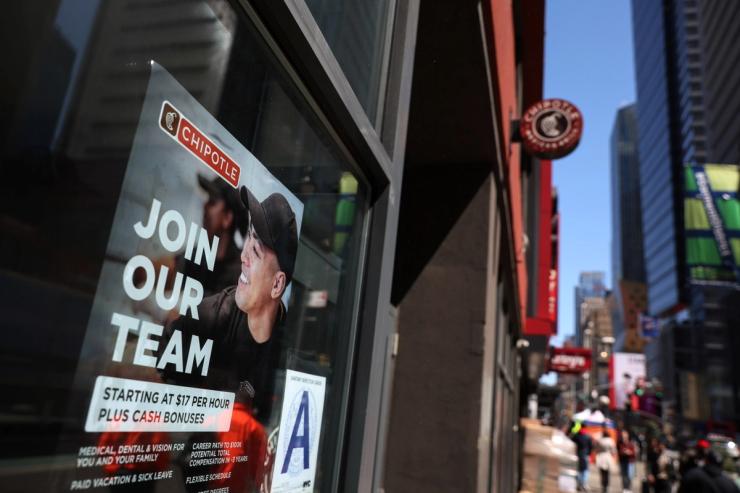 A help wanted sign in New York
