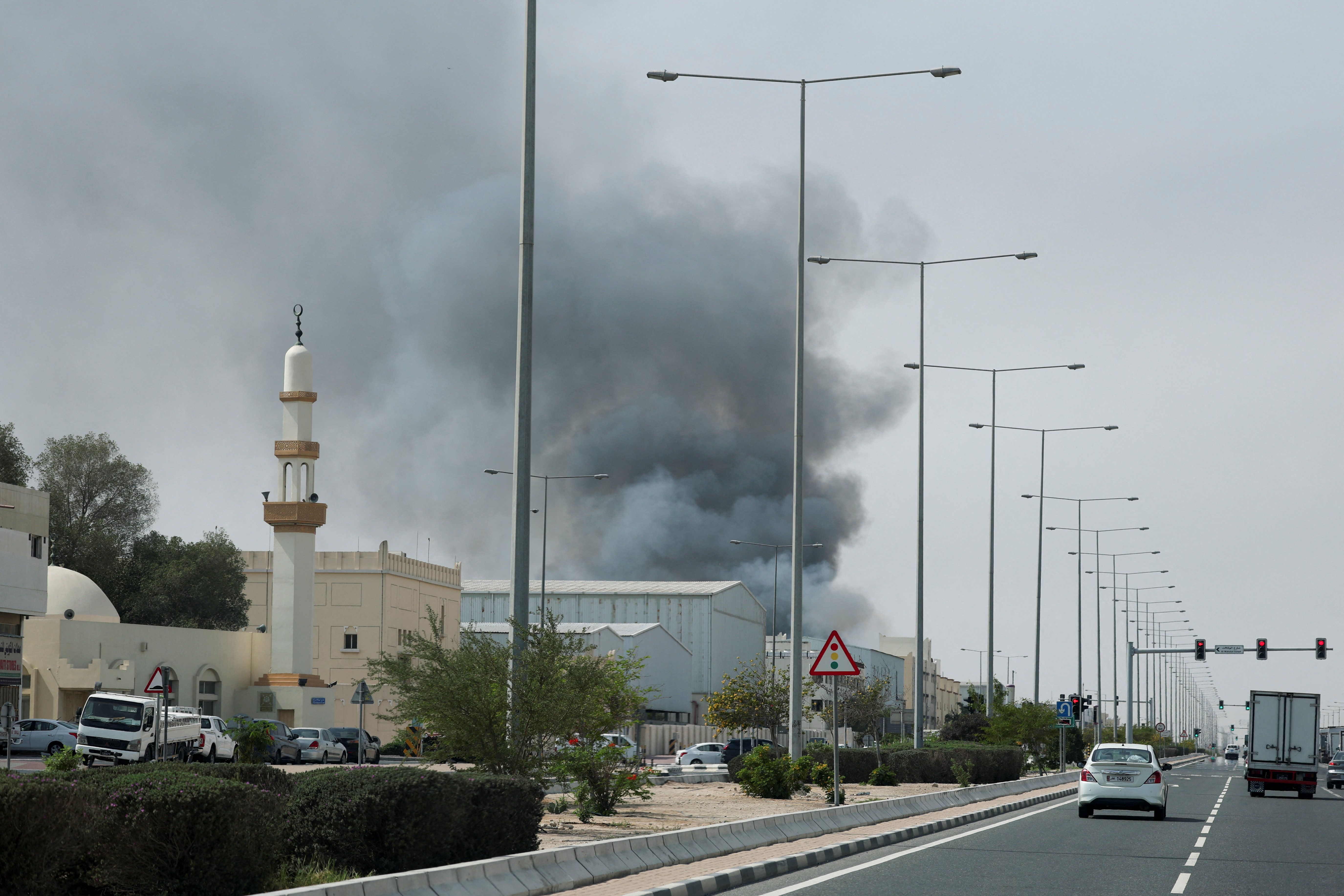 Smoke rises after reported Iranian missile attacks in Doha.