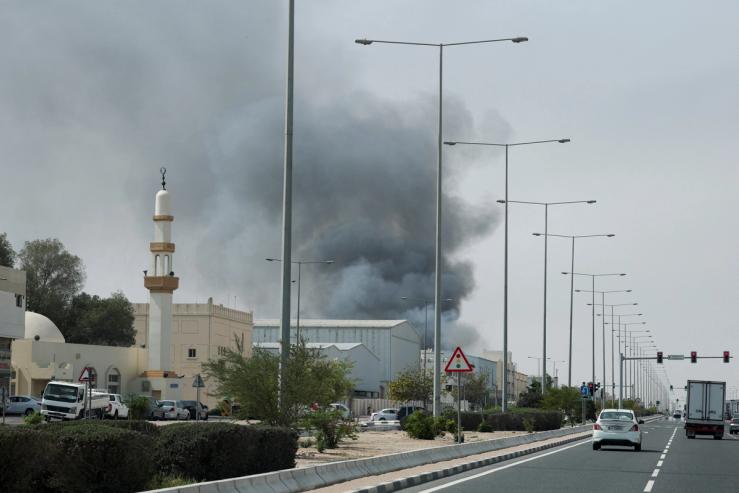 Smoke rises after reported Iranian missile attacks in Doha.