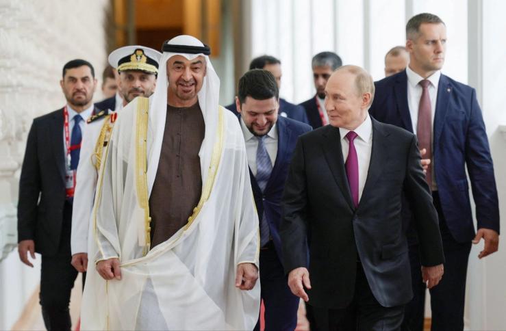 Russian President Vladimir Putin and President of the United Arab Emirates, Sheikh Mohammed bin Zayed Al Nahyan speak during a meeting at the Kremlin in Moscow.