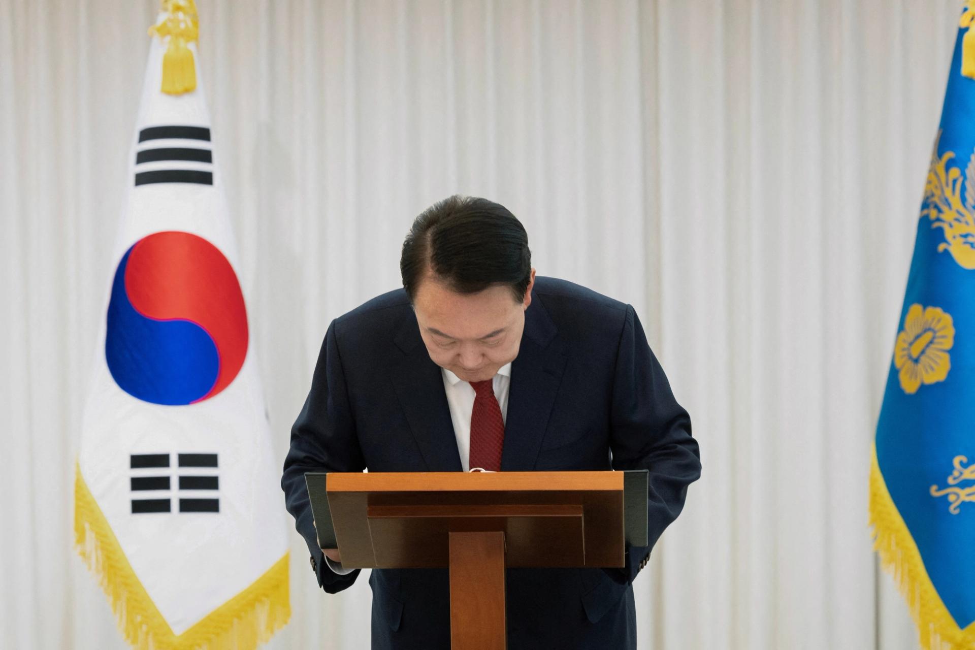 South Korean President Yoon Suk Yeol delivers an address to the nation.