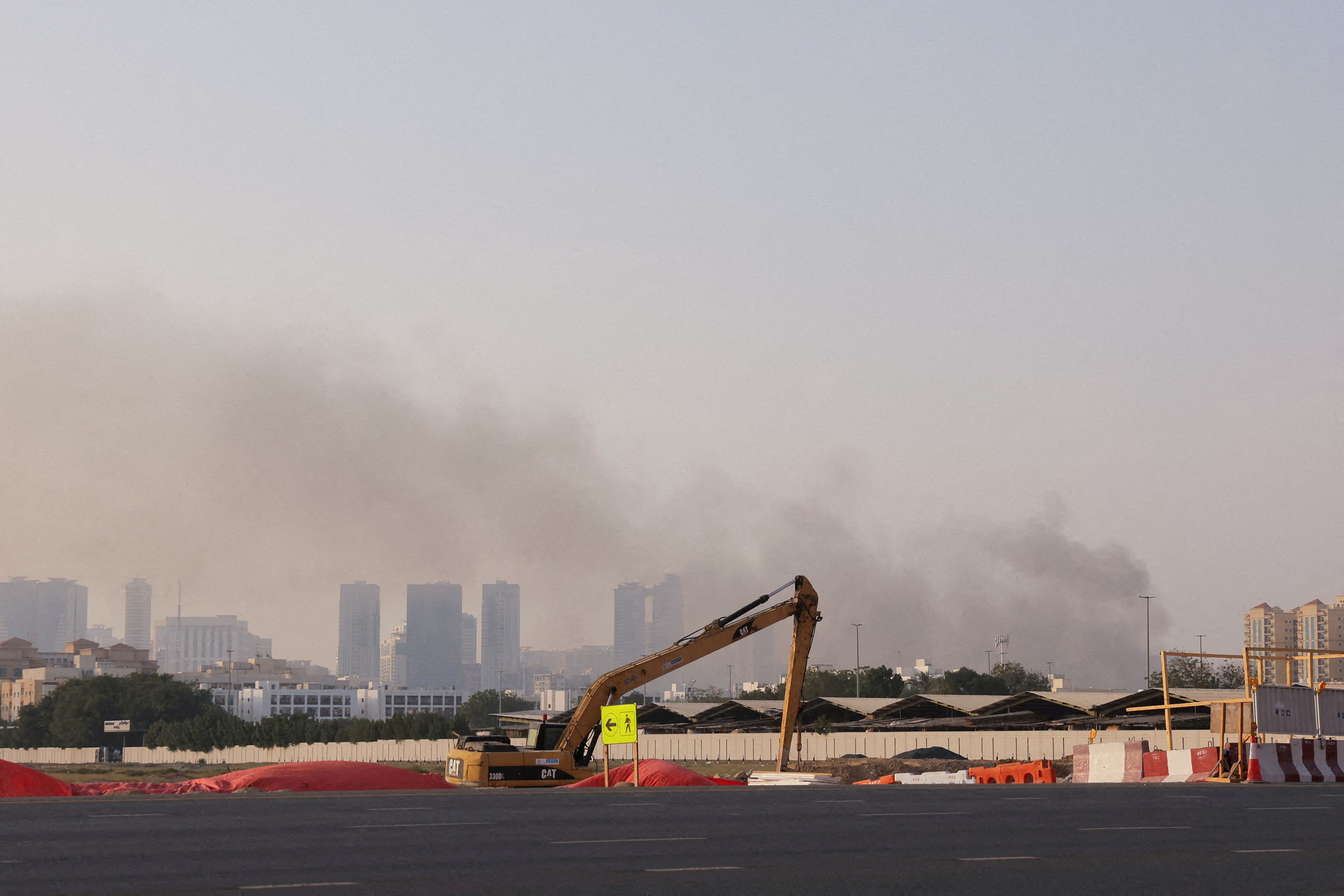 Smoke rises after an Iranian attack, following United States and Israel strikes on Iran, in Sharjah, United Arab Emirates.